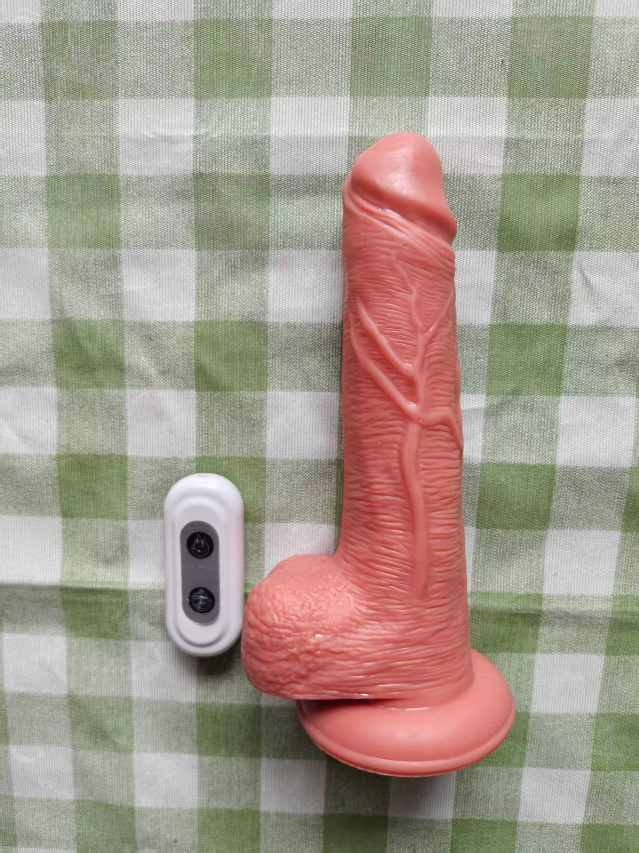 Large wireless electric vibrating and thrusting phallus (rechargeable)
